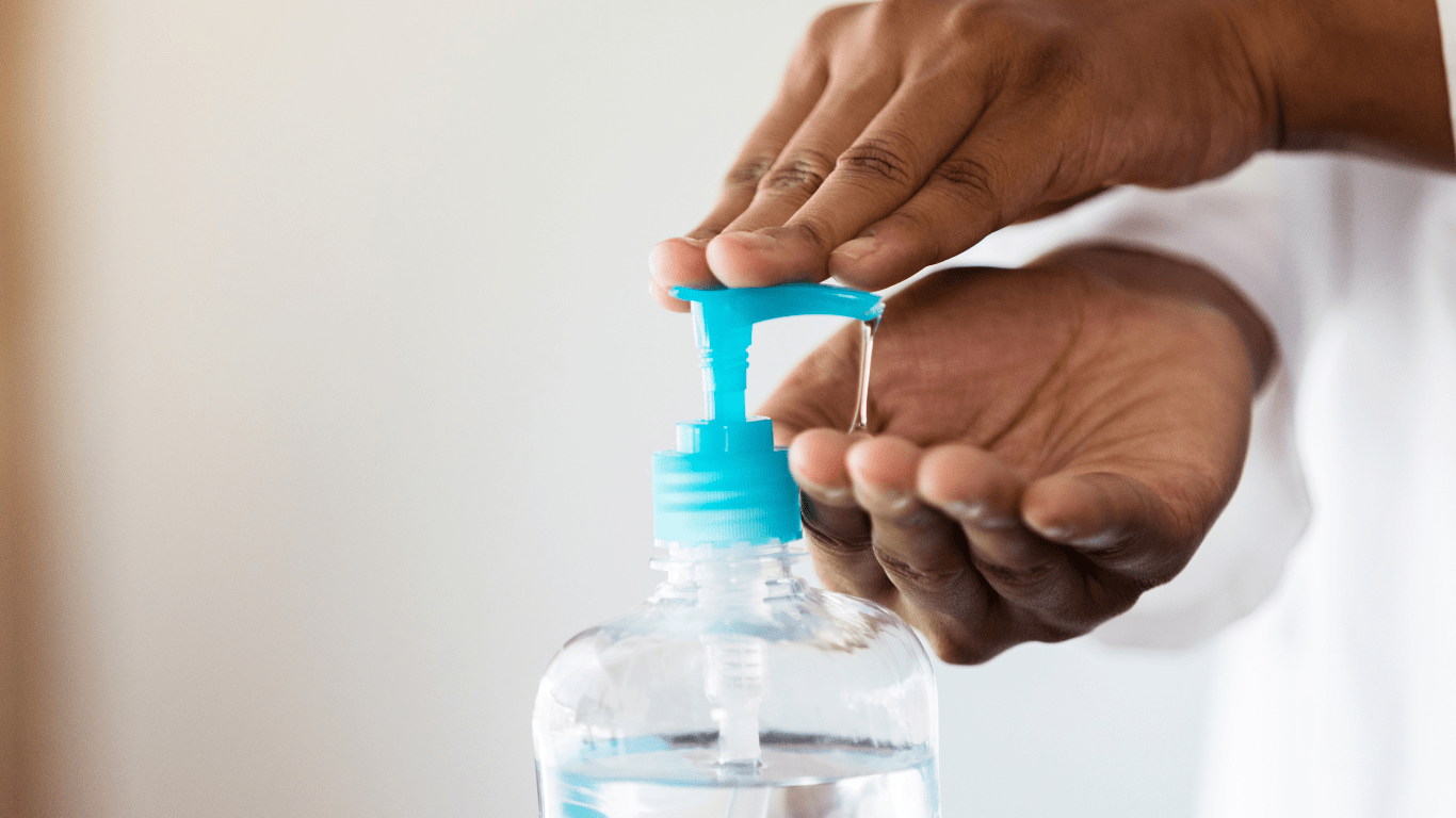 Person demonstrating hand sanitizer safety and proper use.